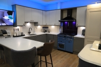 Solent white and grey contrast kitchen units with Stoves richmond deluxe cooker.